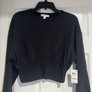 Black long sleeve crop top with tags